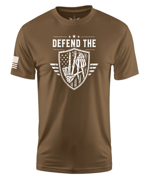 A brown short-sleeve crewneck t-shirt with a white graphic on the chest reading 'DEFEND THE' above a shield design, and a white American flag graphic on the right sleeve, shown on a plain white background.