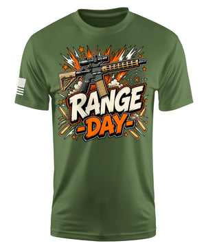 An olive green short-sleeve t-shirt with a 'Range Day' graphic on the chest featuring a rifle, explosions, and text, along with a small American flag print on the right sleeve.