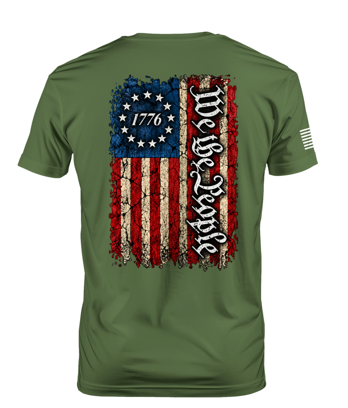 An olive green short-sleeve t-shirt shown from the back, featuring a distressed American flag graphic with the text 'We the People' in gothic font and '1776' inside a circle of stars.