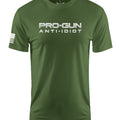 An olive green short-sleeve t-shirt with 'PRO-GUN ANTI-IDIOT' printed in white across the chest and a white American flag graphic on the right sleeve, shown on a plain white background.